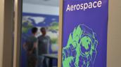 Bild zeigt ein Poster mit Aerospace Schriftzug und einem Astronauten