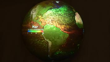 digitaler Globus, leuchtet grün und orange