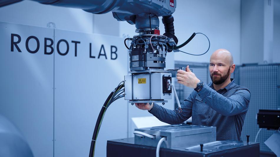 Mitarbeiter und Roboter