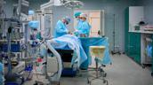 Plastic surgeons work in the operating room