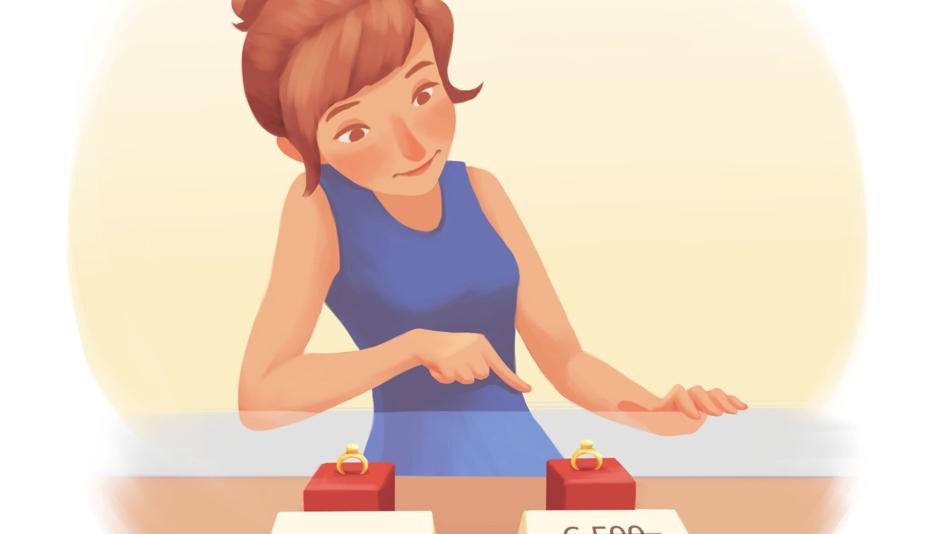 Frau sucht aus Ringen mit verschiedenen Preisen aus